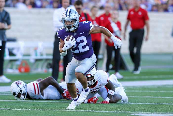 Sep 3, 2022; Manhattan, Kansas, USA; Kansas State Wildcats running back Deuce Vaughn (22) runs the ball for a touchdown against the South Dakota Coyotes in the first quarter at Bill Snyder Family Football Stadium. Mandatory Credit: Scott Sewell-USA TODAY Sports